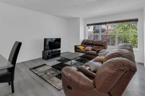 109 Tuscany Springs Gardens Nw, Calgary, AB - Indoor Photo Showing Living Room