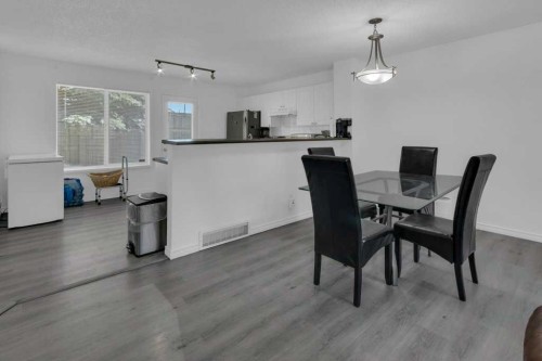 109 Tuscany Springs Gardens Nw, Calgary, AB - Indoor Photo Showing Dining Room