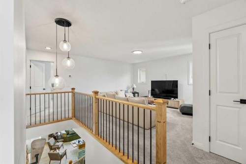 380 Northern Lights Green, Langdon, AB - Indoor Photo Showing Other Room