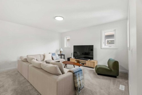 380 Northern Lights Green, Langdon, AB - Indoor Photo Showing Living Room