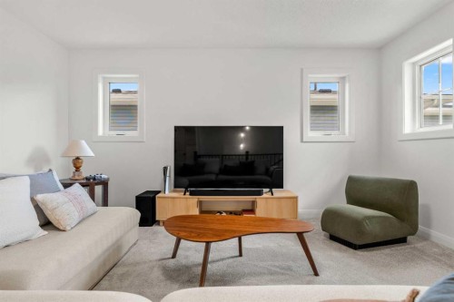 380 Northern Lights Green, Langdon, AB - Indoor Photo Showing Living Room