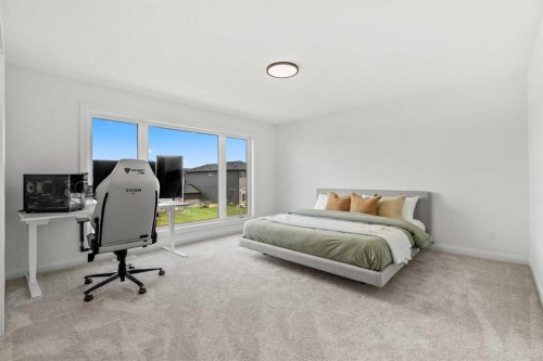 380 Northern Lights Green, Langdon, AB - Indoor Photo Showing Bedroom