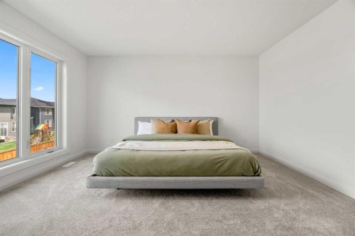 380 Northern Lights Green, Langdon, AB - Indoor Photo Showing Bedroom