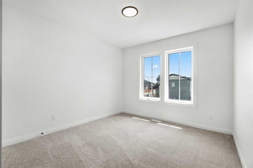 380 Northern Lights Green, Langdon, AB - Indoor Photo Showing Other Room