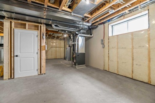 380 Northern Lights Green, Langdon, AB - Indoor Photo Showing Basement