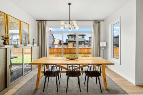 380 Northern Lights Green, Langdon, AB - Indoor Photo Showing Dining Room