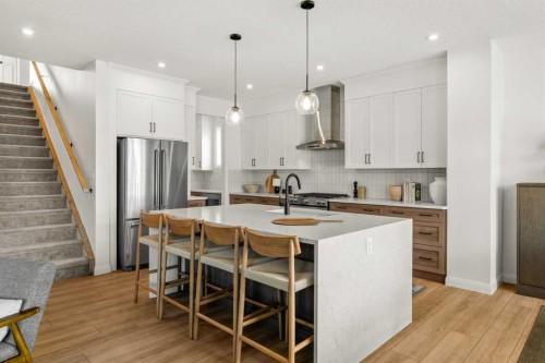 380 Northern Lights Green, Langdon, AB - Indoor Photo Showing Kitchen With Upgraded Kitchen