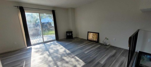 210 Woodmont Court Sw, Calgary, AB - Indoor Photo Showing Other Room