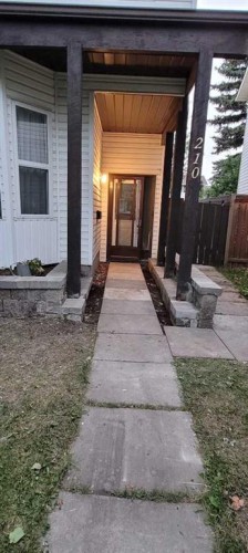 210 Woodmont Court Sw, Calgary, AB - Outdoor