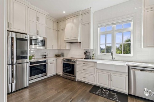 19 Mckendrick Point, Rural Rocky View County, AB - Indoor Photo Showing Kitchen With Upgraded Kitchen