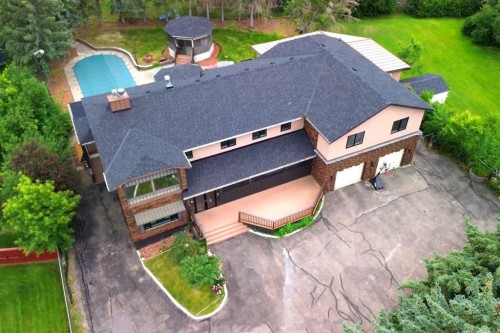 884 East Chestermere Drive, Chestermere, AB - Outdoor With In Ground Pool