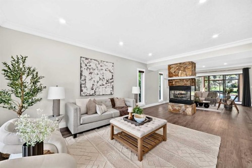 884 East Chestermere Drive, Chestermere, AB - Indoor Photo Showing Living Room With Fireplace