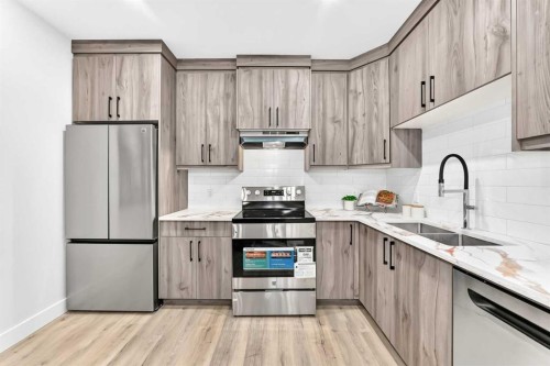 3106 15 Avenue Sw, Calgary, AB - Indoor Photo Showing Kitchen With Double Sink With Upgraded Kitchen