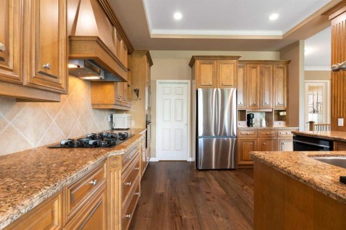 112 Gleneagles View, Cochrane, AB - Indoor Photo Showing Kitchen With Upgraded Kitchen