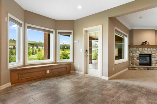 112 Gleneagles View, Cochrane, AB - Indoor With Fireplace
