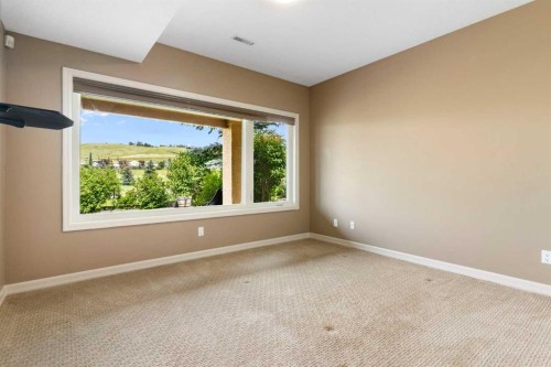 112 Gleneagles View, Cochrane, AB - Indoor Photo Showing Other Room
