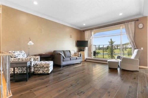 112 Gleneagles View, Cochrane, AB - Indoor Photo Showing Living Room