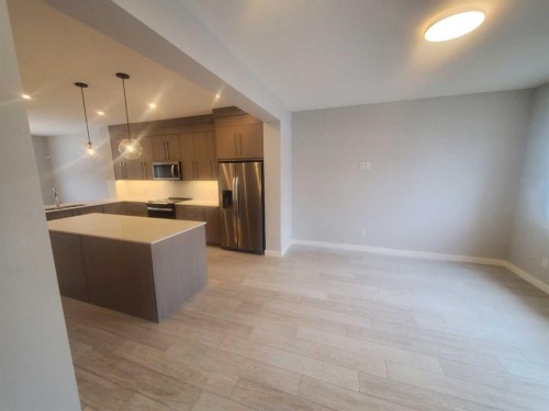 1045 West Lakeview Drive, Chestermere, AB - Indoor Photo Showing Kitchen With Stainless Steel Kitchen