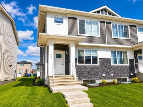 1045 West Lakeview Drive, Chestermere, AB - Outdoor With Facade