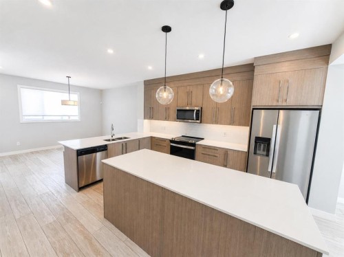 1045 West Lakeview Drive, Chestermere, AB - Indoor Photo Showing Kitchen With Stainless Steel Kitchen With Double Sink With Upgraded Kitchen