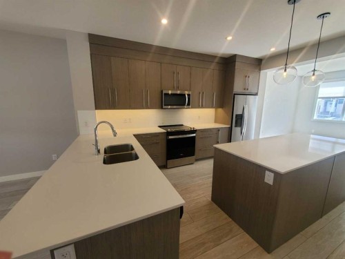1045 West Lakeview Drive, Chestermere, AB - Indoor Photo Showing Kitchen With Stainless Steel Kitchen With Double Sink With Upgraded Kitchen