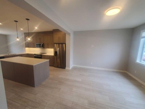 1045 West Lakeview Drive, Chestermere, AB - Indoor Photo Showing Kitchen With Stainless Steel Kitchen