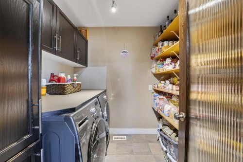 759 Stonehaven Drive, Carstairs, AB - Indoor Photo Showing Laundry Room