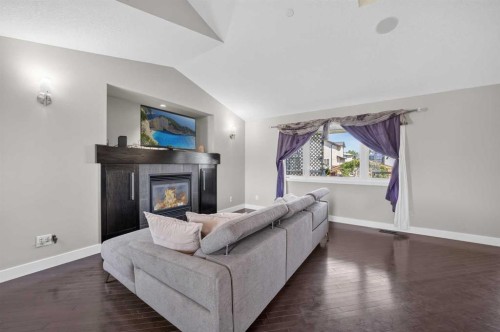 759 Stonehaven Drive, Carstairs, AB - Indoor Photo Showing Other Room With Fireplace