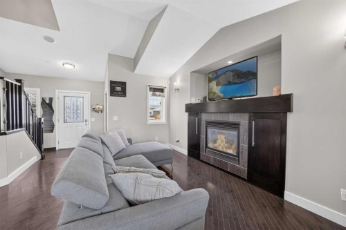 759 Stonehaven Drive, Carstairs, AB - Indoor Photo Showing Living Room With Fireplace