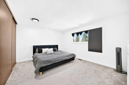 3728 Cedarille Drive Sw, Calgary, AB - Indoor Photo Showing Bedroom