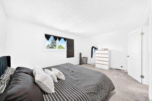 3728 Cedarille Drive Sw, Calgary, AB - Indoor Photo Showing Bedroom