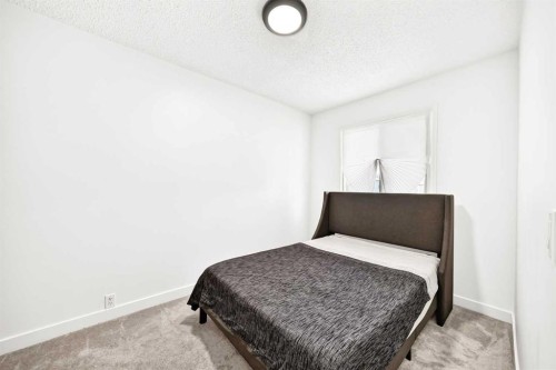 3728 Cedarille Drive Sw, Calgary, AB - Indoor Photo Showing Bedroom