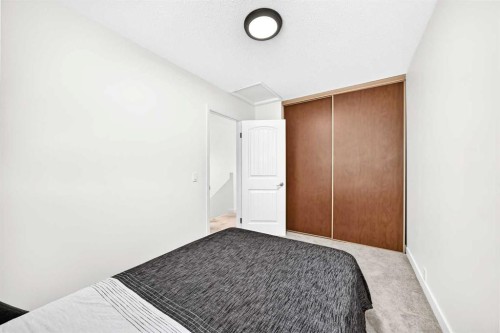3728 Cedarille Drive Sw, Calgary, AB - Indoor Photo Showing Bedroom