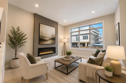 124 Waterford Way, Chestermere, AB - Indoor Photo Showing Living Room With Fireplace