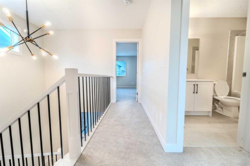 124 Waterford Way, Chestermere, AB - Indoor Photo Showing Other Room