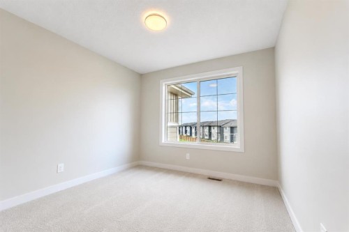 124 Waterford Way, Chestermere, AB - Indoor Photo Showing Other Room