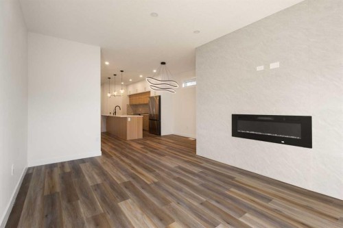 2426 25 Avenue Nw, Calgary, AB - Indoor With Fireplace