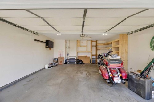 75 Everglade Drive Se, Airdrie, AB - Indoor Photo Showing Garage