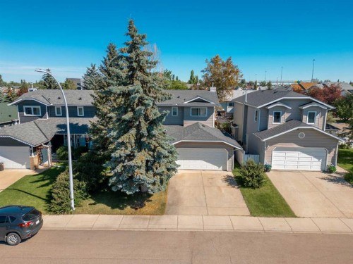 75 Everglade Drive Se, Airdrie, AB - Outdoor With Facade