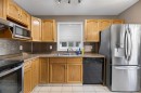 75 Everglade Drive Se, Airdrie, AB  - Indoor Photo Showing Kitchen With Double Sink 