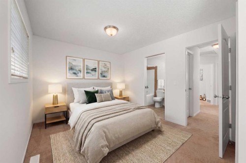 301 Strathaven Mews, Strathmore, AB - Indoor Photo Showing Bedroom
