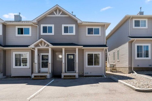 301 Strathaven Mews, Strathmore, AB - Outdoor With Facade