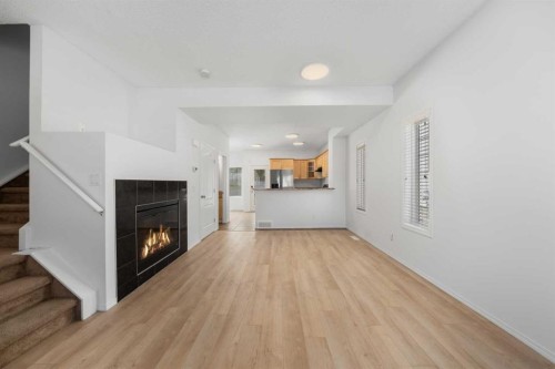 301 Strathaven Mews, Strathmore, AB - Indoor Photo Showing Living Room With Fireplace