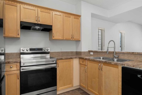 301 Strathaven Mews, Strathmore, AB - Indoor Photo Showing Kitchen With Double Sink