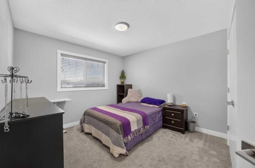 36 Cameron Close, Sylvan Lake, AB - Indoor Photo Showing Bedroom