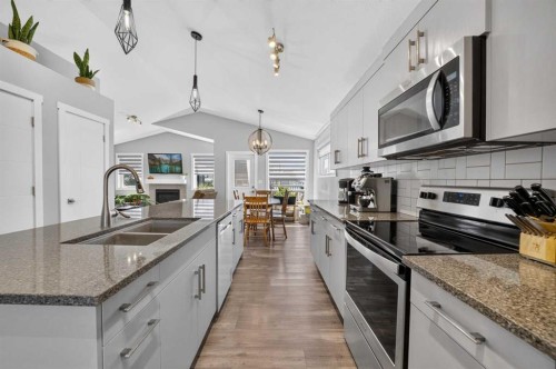 36 Cameron Close, Sylvan Lake, AB - Indoor Photo Showing Kitchen With Double Sink With Upgraded Kitchen