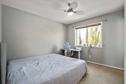 275 Everstone Drive Sw, Calgary, AB - Indoor Photo Showing Bedroom