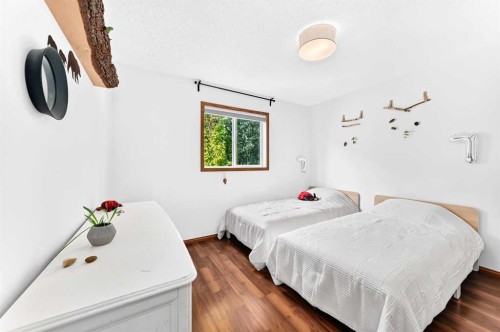 32 Cimarron Meadows Way, Okotoks, AB - Indoor Photo Showing Bedroom