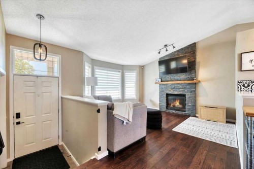 26 Strathford Close, Strathmore, AB - Indoor Photo Showing Living Room With Fireplace