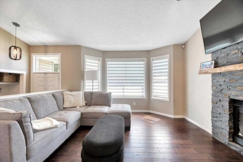 26 Strathford Close, Strathmore, AB - Indoor Photo Showing Living Room With Fireplace